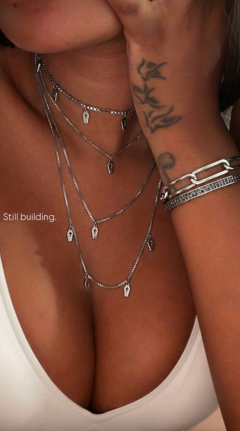 Customer wearing FNTSY jewelry
